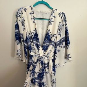 Lovers and Friends romper/ dress. Size small . Blue/ white floral